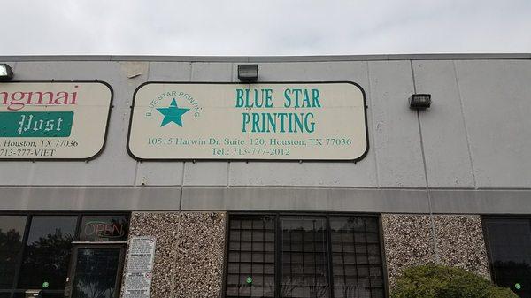 Sign on top of building