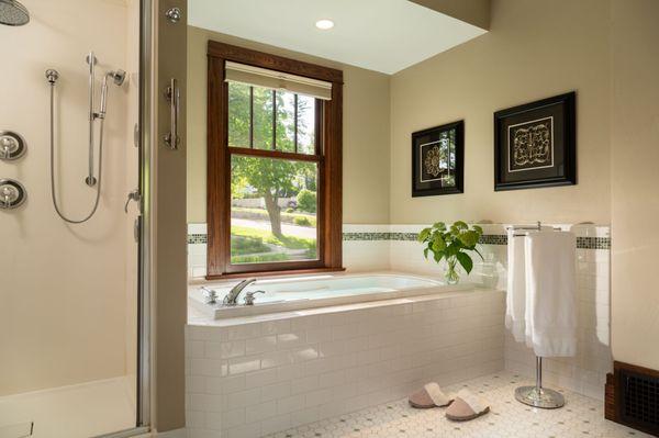 University Suite bathroom with jetted tub and multi-head shower