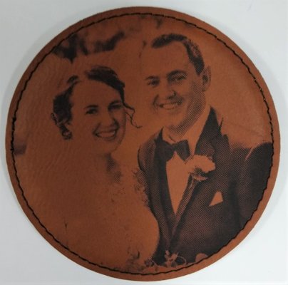 Photos on leatherette coasters. Great wedding gifts