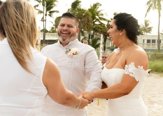 They said yes! candid moment of a wedding on North Miami Beach