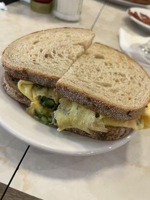 Egg & veggie scramble sandwich on rye