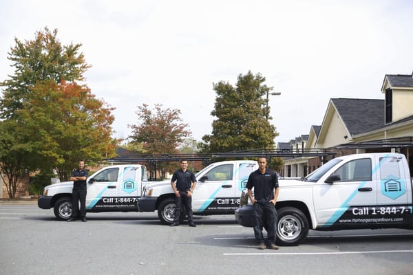 Tip Top Garage Doors- Technicians Vehicles