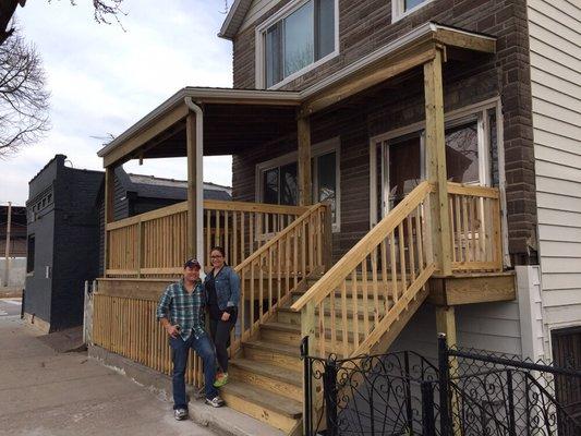 Happy clients with their new rooftop deck.