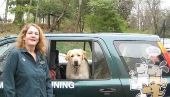 Howard County Bark Buster Marsha Engel and one of her dogs, Dually