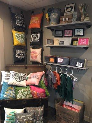 Display of pillows, bags and kids clothing