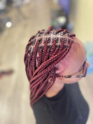 Butt length , medium size knotless braids. Color 99j (burgundy)