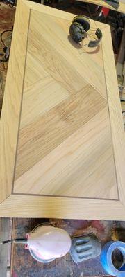 Jacquelin requested a custom chevron coffee table with Walnut inlay and I was happy to accept the job.