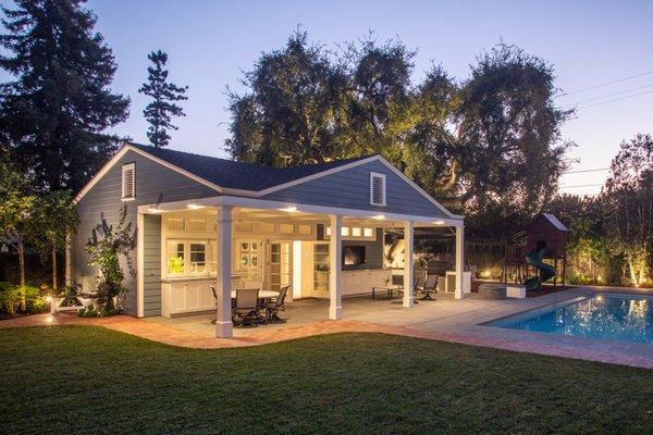 New pool house with outdoor amenities and modern design.