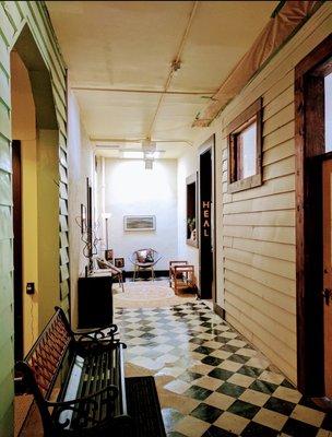 The upstairs hallway looking west with HEAL at back right