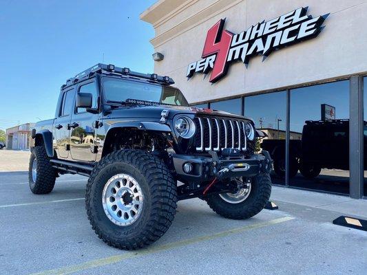 2020 Jeep JT that has a 4" Superlift lift kit with fox shocks