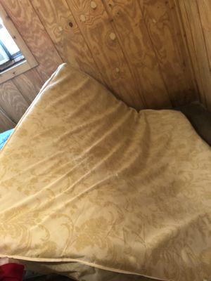 One side of the mattress that was inside the camper.