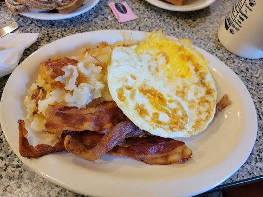 Eggs, potatoes, bacon and toast