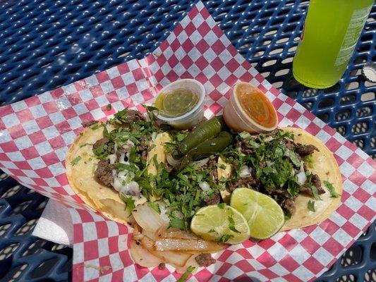 Three steak tacos.