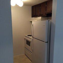 Kitchens include stove and refrigerator