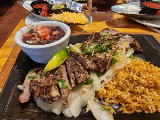 Steak sizzling fajitas