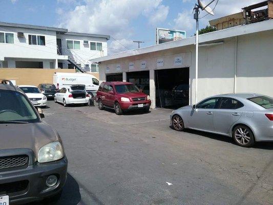 Back of the garage. When bringing your car - enter through the back!