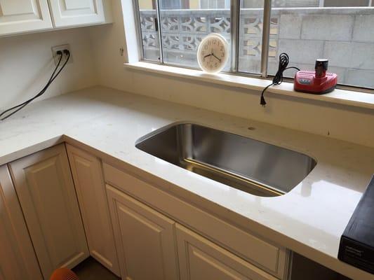 White quartz countertop with Undermount sink