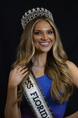 Miss Florida USA 2023, Caroline Dixon, wearing her "Official Crown Ring" designed and manufactured in our Downtown Palm Harbor Studio.