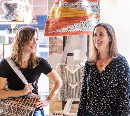 Owners Jen and Rachel having fun in the shop during the Decatur Living photo shoot.