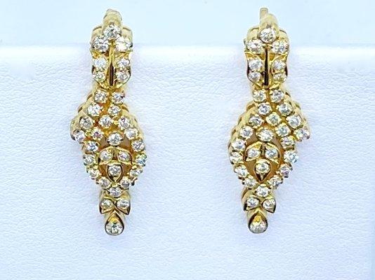 Fancy diamond drop earrings in yellow.