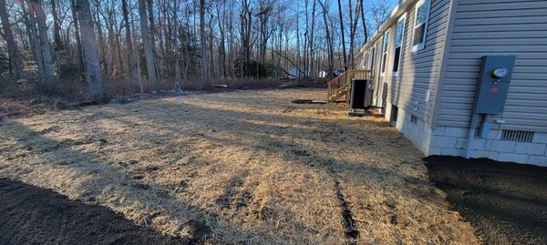 Final look at yard graded, seeded, and straw applied for soil conservation (required in certain counties).