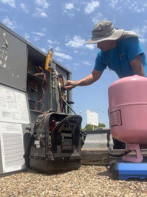 Dialing in the correct refrigerant charge.