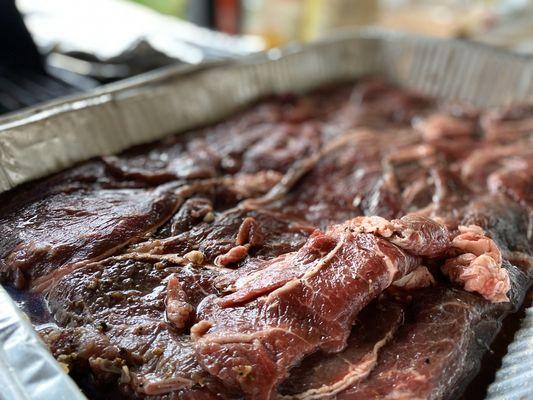 Marinating the carne asada. A family recipe passed down. Thank goodness the flavor lives on for generations to come!