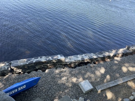 Just more photos of the wall leaning further into the water