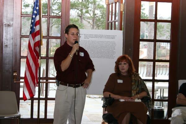 Mr. Neal with a victim of medical malpractice at a town hall meeting in 2004 held by Mr. Neal opposing the tort reform laws.