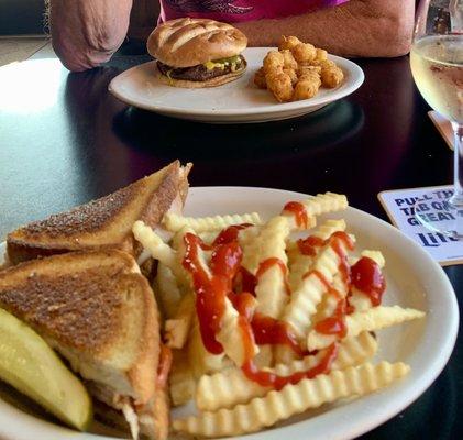 Turkey melt w/fries; hamburger & tater tots.