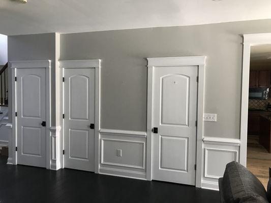 Chair rail, picture frames, door trim, and wall paint