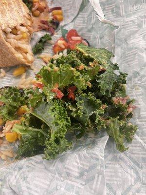 That much huge pieces of kale picked out of half of a burrito