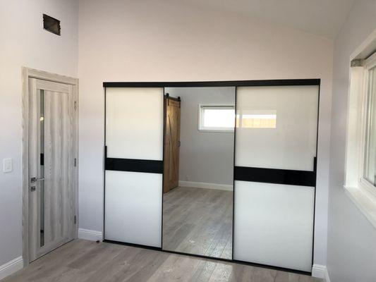 Closet sliding doors and PSK8 interior door by A&E modern construction