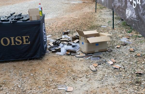 Spent Rifle rounds ammo boxes.