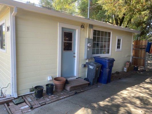 Side view of house after it was painted by Painting Your World