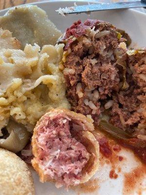 Inside of Reuben ball, cabbage roll and pierogi.