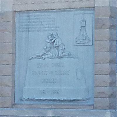 relief on the east side of the monument