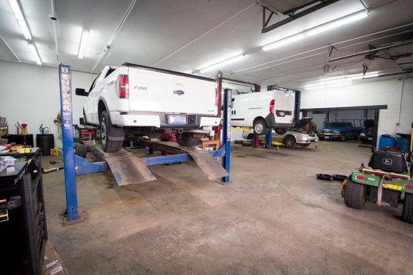 Inside of our automotive shop where we provide oil changes, engine diagnostics, brake repairs, and more!