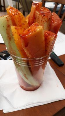 Fruit cup with tajin seasoning and lime juice