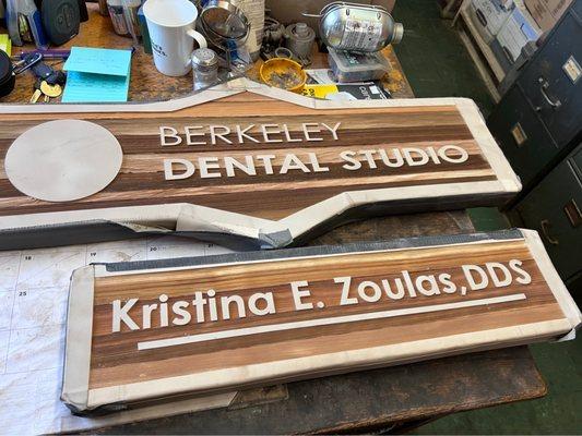 Smaller wood (cedar) signs