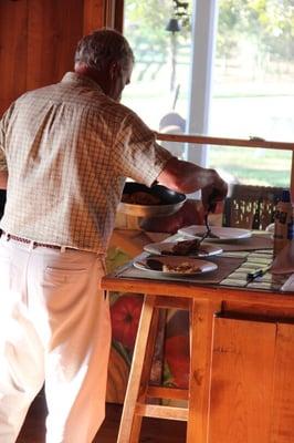 snuck a shot of the Colonel making our breakfast