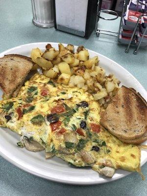 Veggie Omelette w/ home fries and rye