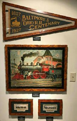 Historic railroad items we framed for a collector/client. Love the pennant shaped frame. Cool & challenging, that's what we do.