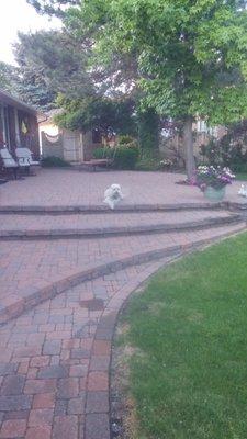 backyard patio includes sidewalk to both outside gates