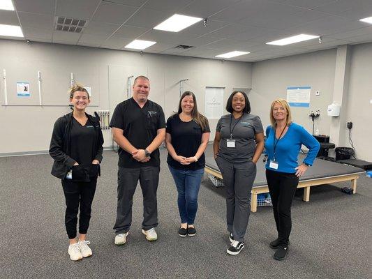 The Complete Care Integrative Physical Medicine team with their first patient on March 21, 2023.