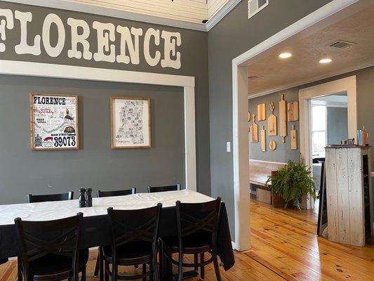 Back dining room and reception desk.