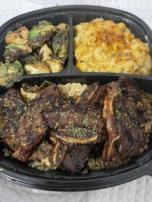 Korean beef short ribs. Over the rice and fried Brussels with 5 cheese Mac n cheese