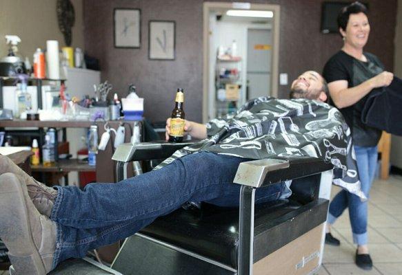 Enjoying his shiner while getting ready for a shave