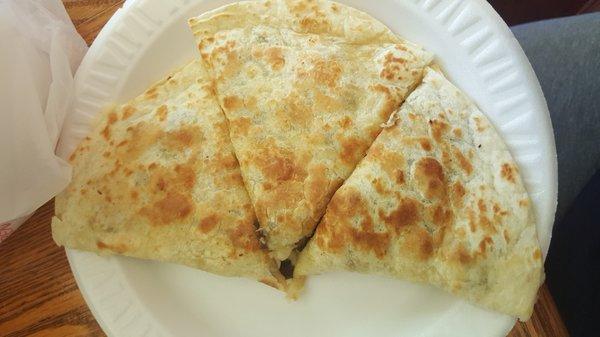 Humongous quesadilla with carne asada and cheese!