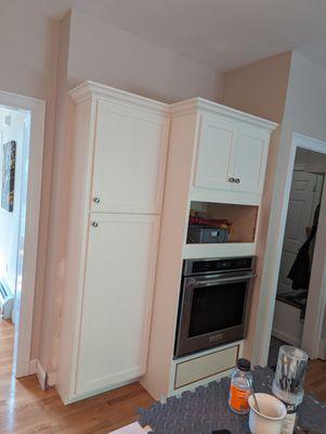 completely reworked this cabinet for pantry and new microwave